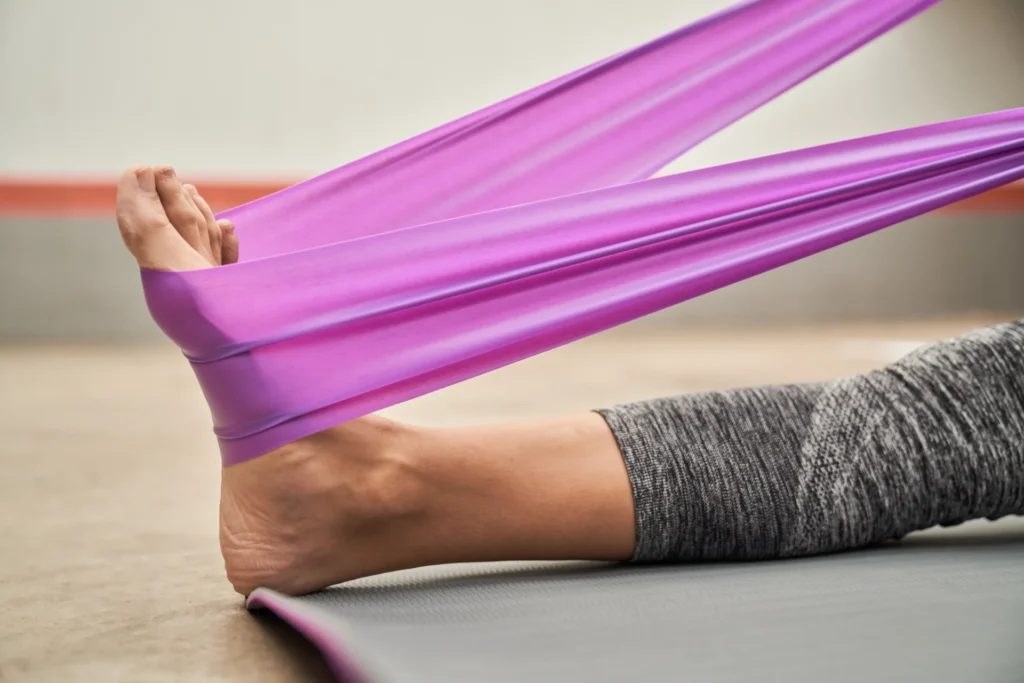 woman using resistance band for exercise indoors 2026 03 25 02 22 01 utc