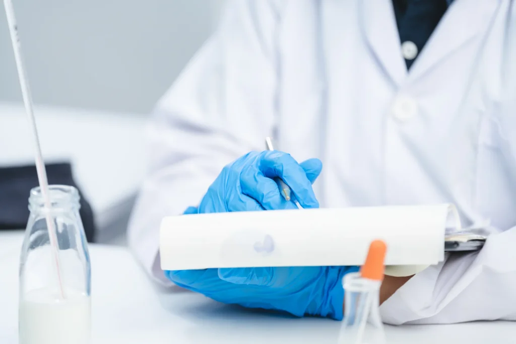 researcher noting experiment results in lab 2026 03 24 22 08 58 utc 1