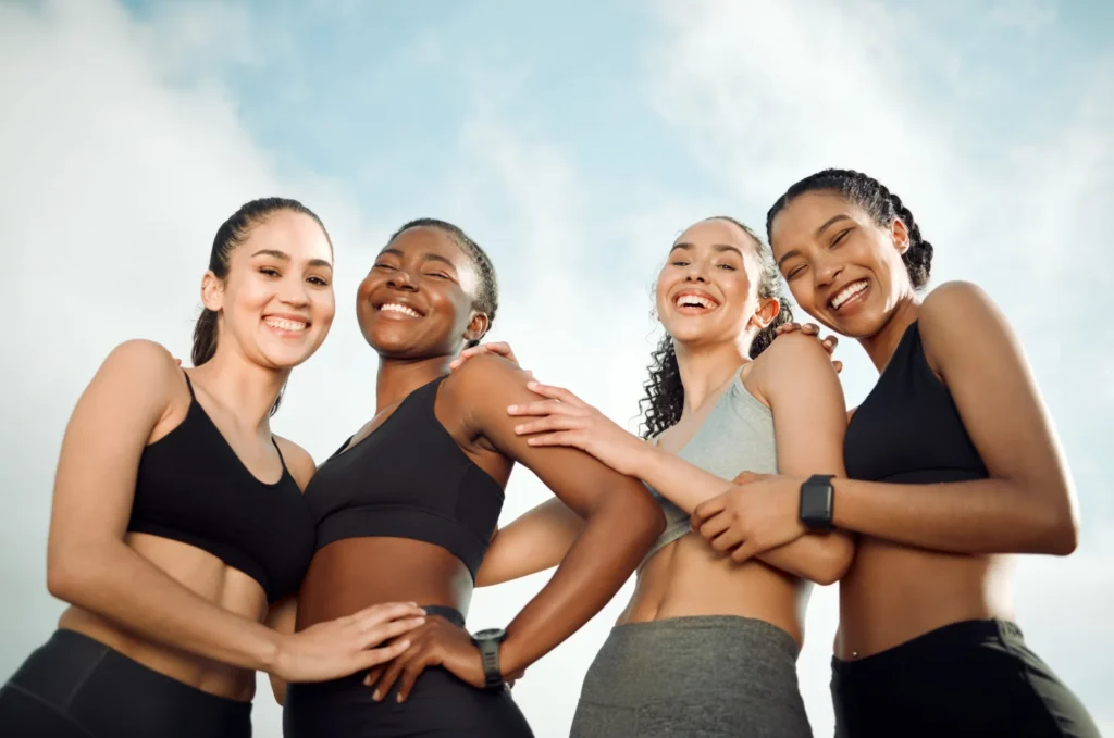 smiling women wearing athletic wear in low angle s 2026 09 24 12 34 31 utc